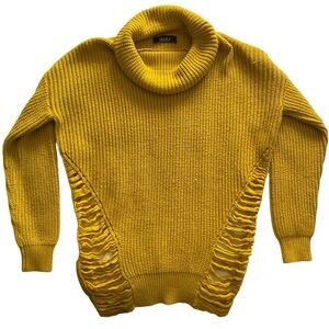 Mustard yellow, oversized Akira sweater with cutouts.